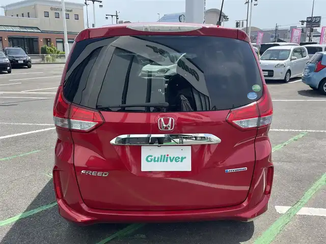 ホンダ フリード ハイブリット G ホンダセンシング 長崎県 2018(平30)年 10.6万km プレミアムクリスタルレッドM ワンオーナー/純正ナビ/(フルセグ・DVD・CD・SD・BT)/バックカメラ/ドライブレコーダー/ホンダセンシング/ETC/レーダークルーズコントロール/レーンキープアシスト/ステアリングスイッチ/両側パワースライドドア/スペアキー/スマートキー/LEDヘッドライト/オートライト/純正フロアマット