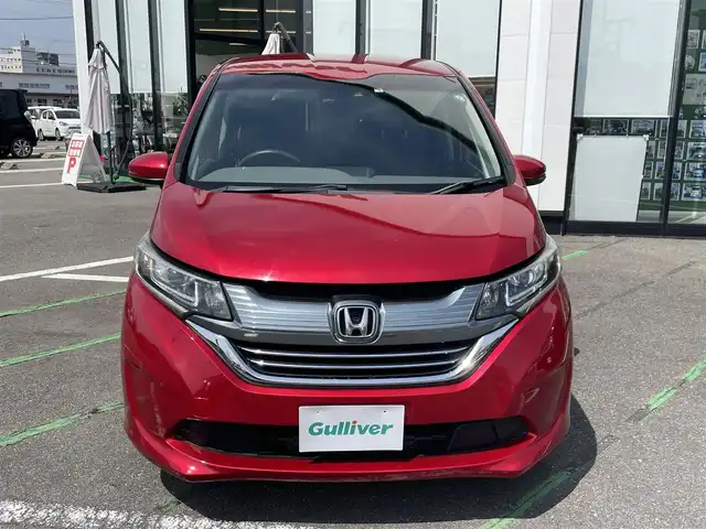 ホンダ フリード ハイブリット G ホンダセンシング 長崎県 2018(平30)年 10.6万km プレミアムクリスタルレッドM ワンオーナー/純正ナビ/(フルセグ・DVD・CD・SD・BT)/バックカメラ/ドライブレコーダー/ホンダセンシング/ETC/レーダークルーズコントロール/レーンキープアシスト/ステアリングスイッチ/両側パワースライドドア/スペアキー/スマートキー/LEDヘッドライト/オートライト/純正フロアマット