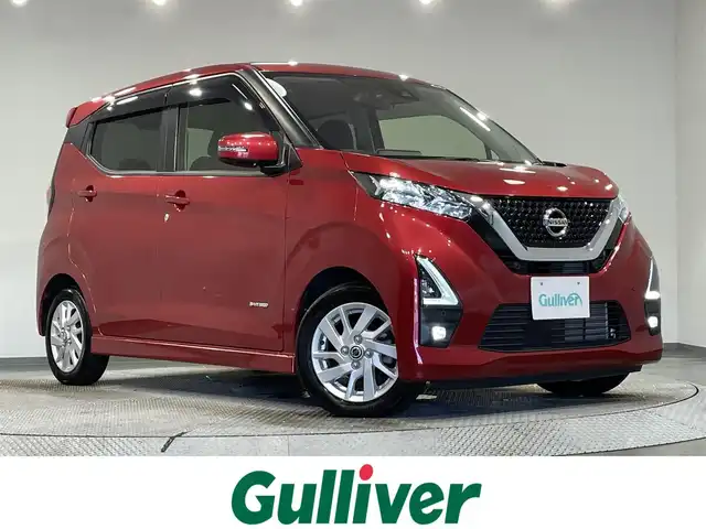 日産 デイズ HWS X プロパイロットED 愛知県 2020(令2)年 2.2万km スパークリングレッドM 純正９インチナビ　/（Bluetooth/フルセグTV/SD/CD・DVD再生/FM/AM)/アラウンドビューモニター　/プロパイロット　/衝突軽減ブレーキ　/ビルトインＥＴＣ　/ＬＥＤヘッドライト　/LEDフォグランプ/ドライブレコーダー　/ソナー　/車線逸脱警報　/先行車発進お知らせ/プッシュスタート　/オートブレーキホールド機能/純正フロアマット