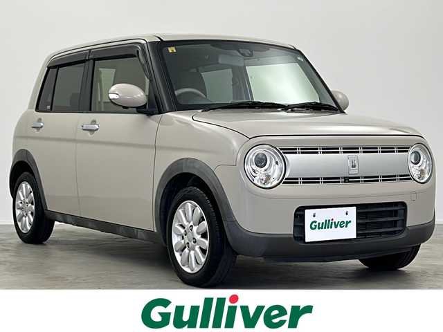 スズキ ラパン X 大阪府 2016(平28)年 5.8万km フォーンベージュM 純正メモリナビ/・フルセグTV/・Bluetooth/・CD/DVD/・AppleCarPlay/全方位カメラ/デュアルカメラブレーキサポート/運転席シートヒーター/純正14インチアルミホイール/キセノンヘッドライト/オートエアコン/スマートキー/プッシュスタート