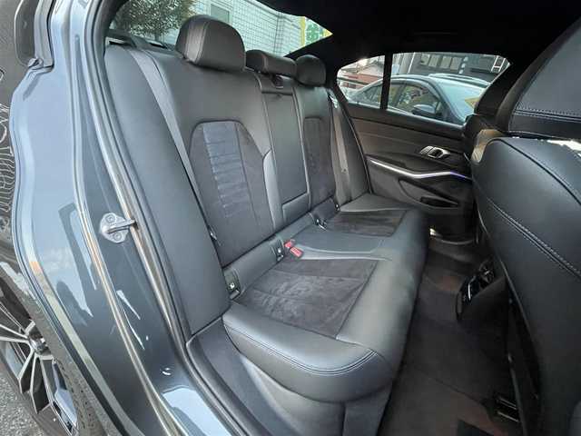 ＢＭＷ ３１８ｉ Mスポーツ 愛知県 2021(令3)年 4.8万km ミネラルグレー /禁煙車//純正メーカーナビ//ミラーリング機能有//バックカメラ//全周囲カメラ//コーナーセンサー//ハーフレザーシート//前席パワーシート//運転席シートメモリ機能//シートヒーター//社外エアロ（マクストンデザイン）//前後フォグランプ//アダプティブクルーズコントロール//オートエアコン//オートライト//オートハイビーム//保証書//取扱説明書//スペアキー