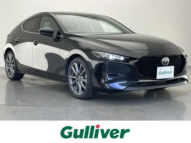 マツダ マツダ３ファストバック 20S Lパッケージ 愛知県 2020(令2)年 5.5万km ジェットブラックマイカ 純正ナビ　全方位カメラ　シートヒーター　禁煙車　フルセグＴＶ　ＤＶＤ　ＨＤＭＩ　ＢＳＭ　ＨＵＤ　衝突軽減　追従クルコン　黒革　ＬＥＤオートライト　コーナーセンサー　ハンドルヒーター　純正フロアマット