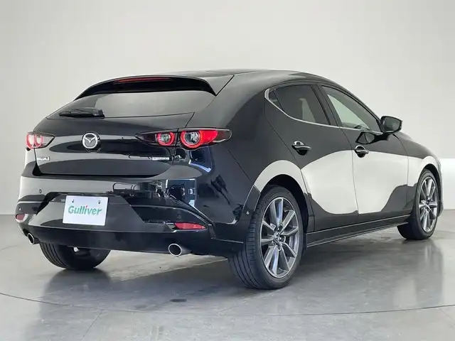 マツダ マツダ３ファストバック 20S Lパッケージ 愛知県 2020(令2)年 5.5万km ジェットブラックマイカ 純正ナビ　全方位カメラ　シートヒーター　禁煙車　フルセグＴＶ　ＤＶＤ　ＨＤＭＩ　ＢＳＭ　ＨＵＤ　衝突軽減　追従クルコン　黒革　ＬＥＤオートライト　コーナーセンサー　ハンドルヒーター　純正フロアマット