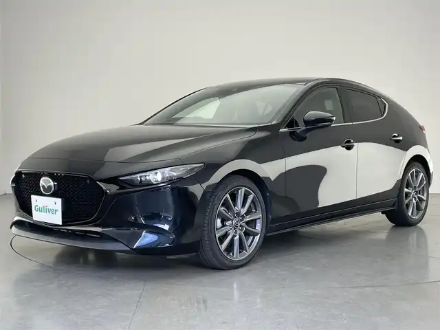 マツダ マツダ３ファストバック 20S Lパッケージ 愛知県 2020(令2)年 5.5万km ジェットブラックマイカ 純正ナビ　全方位カメラ　シートヒーター　禁煙車　フルセグＴＶ　ＤＶＤ　ＨＤＭＩ　ＢＳＭ　ＨＵＤ　衝突軽減　追従クルコン　黒革　ＬＥＤオートライト　コーナーセンサー　ハンドルヒーター　純正フロアマット