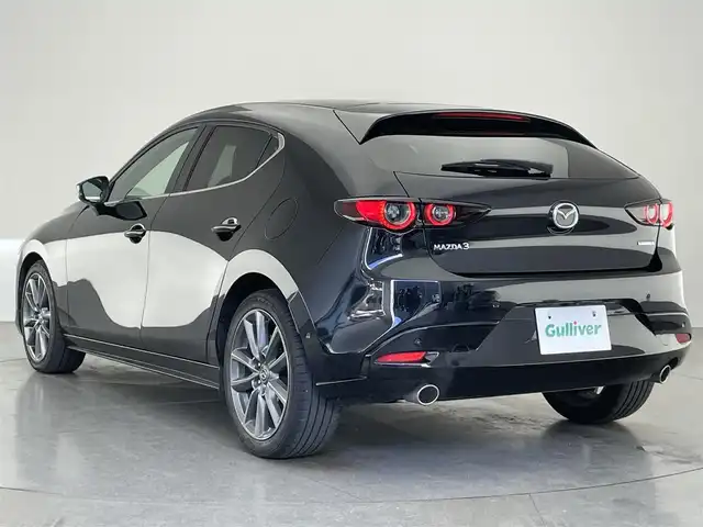 マツダ マツダ３ファストバック 20S Lパッケージ 愛知県 2020(令2)年 5.5万km ジェットブラックマイカ 純正ナビ　全方位カメラ　シートヒーター　禁煙車　フルセグＴＶ　ＤＶＤ　ＨＤＭＩ　ＢＳＭ　ＨＵＤ　衝突軽減　追従クルコン　黒革　ＬＥＤオートライト　コーナーセンサー　ハンドルヒーター　純正フロアマット