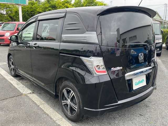 ホンダ フリード スパイク ハイブリット ジャストセレクション 神奈川県 2012(平24)年 12.5万km プレミアムブラキッシュパール 純正メモリナビ/VXM-122VEi/（BT/CD/DVD/FM/AM/TV）/ウィンカーミラー/バックカメラ/ドアバイザー/片側パワースライドドア/ETC/スペアキー/クルーズコントロール/キセノンヘッドライト