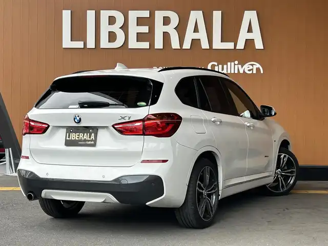 ＢＭＷ Ｘ１ xDrive 18d Mスポーツ 高知県 2018(平30)年 4.6万km アルピンホワイトⅢ 登録時走行距離　45611km/純正HDDナビ/バックカメラ/アドバンスドアクティブセーフティパッケージ/　アクティブクルーズコントロール/　ヘッドアップディスプレイ/ハイラインパッケージ/　パーフォレーション/　パワーシート/　シートヒーター/コンフォートパッケージ/　パワーバックドア/　リアシートスライディング/バックレストリリース機能/インテリジェントセーフティ/クリアランスソナー/ETC/オートワイパー/オートライト/純正LEDライト/フォグランプ/スマートキー/プッシュスタート/純正オプションアルミホイール 19インチ/ドアバイザー/ウインカーミラー/純正フロアマット/新車時整備手帳（保証書）/取扱説明書