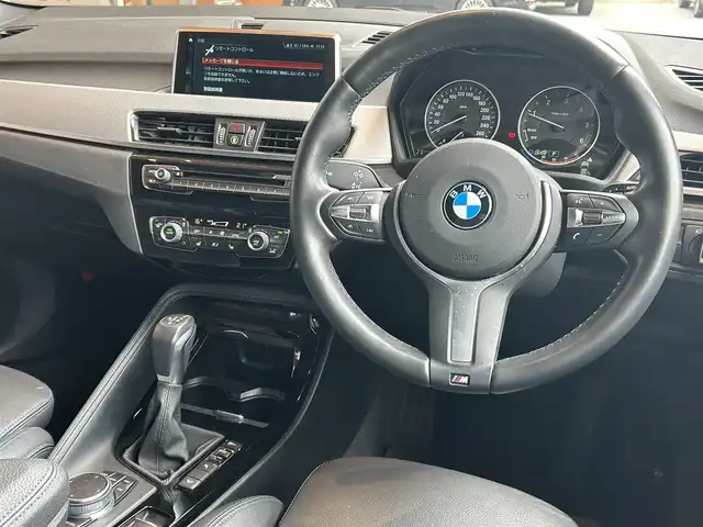 ＢＭＷ Ｘ１ xDrive 18d Mスポーツ 高知県 2018(平30)年 4.6万km アルピンホワイトⅢ 登録時走行距離　45611km/純正HDDナビ/バックカメラ/アドバンスドアクティブセーフティパッケージ/　アクティブクルーズコントロール/　ヘッドアップディスプレイ/ハイラインパッケージ/　パーフォレーション/　パワーシート/　シートヒーター/コンフォートパッケージ/　パワーバックドア/　リアシートスライディング/バックレストリリース機能/インテリジェントセーフティ/クリアランスソナー/ETC/オートワイパー/オートライト/純正LEDライト/フォグランプ/スマートキー/プッシュスタート/純正オプションアルミホイール 19インチ/ドアバイザー/ウインカーミラー/純正フロアマット/新車時整備手帳（保証書）/取扱説明書