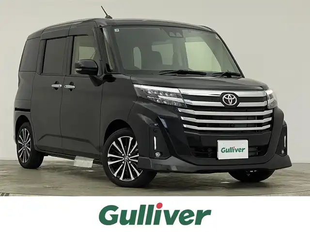 トヨタ ルーミー カスタムG－T 宮城県 2025(令7)年 0.1千km ブラックマイカメタリック 登録済未使用車　/純正９型ディスプレイ　/全周囲カメラ　/両側パワースライドドア　/シートヒーター　/ＥＴＣ２．０　/ディスプレイ連動ドライブレコーダー(前後)　/純正フロアマット／バイザー　/ＴＶキャンセラー　/衝突軽減ブレーキ/レーンキープアシスト/オートハイビーム/クリアランスソナー/電動パーキングブレーキ/オートホールド/純正15インチAW/LEDヘッドランプ/フォグランプ/デイライト/後席サンシェード