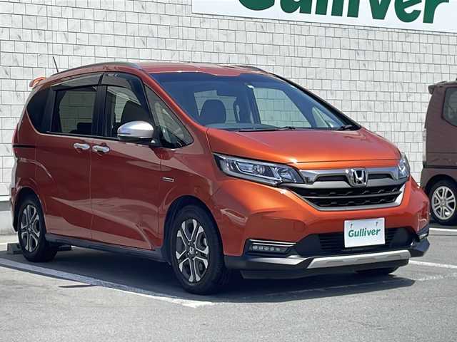 ホンダ フリード＋ ハイブリット クロスター ホンダセンシング 静岡県 2020(令2)年 5.5万km プレミアムクリスタルオレンジM ワンオーナー/純正ナビ/地デジTV/純正CD/DVD/Bluetooth/バックカメラ/両側パワースライドドア/ホンダセンシング/レーダークルーズコントロール/LEDヘッドライト/ビルトインETC/純正15インチAW/スマートキー/スペアキー/保証書/取説