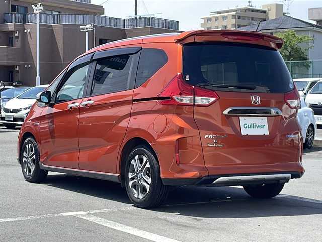 ホンダ フリード＋ ハイブリット クロスター ホンダセンシング 静岡県 2020(令2)年 5.5万km プレミアムクリスタルオレンジM ワンオーナー/純正ナビ/地デジTV/純正CD/DVD/Bluetooth/バックカメラ/両側パワースライドドア/ホンダセンシング/レーダークルーズコントロール/LEDヘッドライト/ビルトインETC/純正15インチAW/スマートキー/スペアキー/保証書/取説