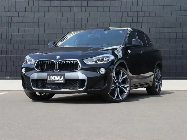 ＢＭＷ Ｘ２ xDrive20i MスポーツX 宮城県 2019(平31)年 4万km サファイアブラックP 純正ナビ（ＢＴ）/ACC/インテリジェントセーフティ/ダイナミックトラクションコントロール/パークディスタンス/ダウンヒルアシスト/バックカメラ/ドライブモード/ブラウンレザーシート/パワーシート（DN席）/コーナーセンサー（前後）/デュアルエアコン/電動格納ミラー/ドライブレコーダー（前方）/リヤフォグランプ/フロントフォグランプ/プッシュスタート/コンフォートアクセス/MTモード付/ミラー一体型ETC/純正20インチAW/純正フロアマット/ＬＥＤヘッドライト/オートライト/アイドリングストップ/禁煙車