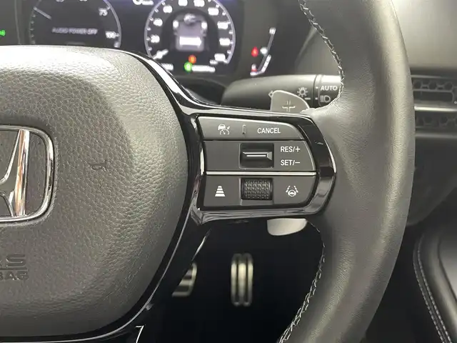 ホンダ ＺＲ－Ｖ ハイブリッド e:HEV Z 熊本県 2023(令5)年 0.9万km ミッドナイトブルービームM ワンオーナー　/ＢＯＳＥサウンド　/社外前後ドライブレコーダー　/全周囲カメラ　/純正ナビ　/ビルトインＥＴＣ２．０　/ホンダセンシング/・レーダークルーズコントロール/・衝突軽減ブレーキ/・路外逸脱制御機能/・車線維持支援システム/・トラフィックジャムアシスト/・先行車発進お知らせ機能/・標識認識機能/・パーキングセンサー/横滑り防止/前後クリアランスソナー　/前席シートヒーター　/前席パワーシート/置くだけ充電/パワーバックドア/パドルシフト/オートブレーキホールド/純正フロアマット/純正１８インチAW/シーケンシャルウインカー/オートライト/LEDヘッドライト/スマートキー/プッシュスタート/スペアキー1本/保証書/取扱説明書