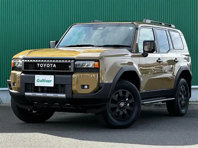 トヨタ ランドクルーザー ２５０ VX ファーストエディション 宮城県 2024(令6)年 0.8万km ベージュ ムーンルーフ/ルーフレール/セーフティセンス/・プリクラッシュセーフティ/・レーダークルーズコントロール/・レーンディパーチャーアラート/・レーントレーシングアシスト/・オートマチックハイビーム/・ドライバー異常検知対応システム/・プロアクティブドライビングアシスト/・発進遅れ告知機能/・緊急時操舵支援/・フロントトラフィックアラート/・レーンチェンジアシスト/・ロードサインアシスト/パーキングサポートブレーキ（前後方静止物/後方接近車両/後方歩行者）/トヨタチームメイト（アドバンストドライブ）/デジタルインナーミラー/純正12.3インチディスプレイオーディオ/・コネクティッドナビ対応/・フルセグTV/・HDMI入力/USB入力/・AppleCarPlay/AndroidAuto/・ＡＭ/FMチューナー/・パイオニアプレミアムサウンドシステム/パワーバックドア/本革シート/パワーシート/ベンチレーション付快適温熱シート/ステアリグヒーター/3眼LEDヘッドライト/純正丸目ヘッドライト車載/オートライト/トノカバー