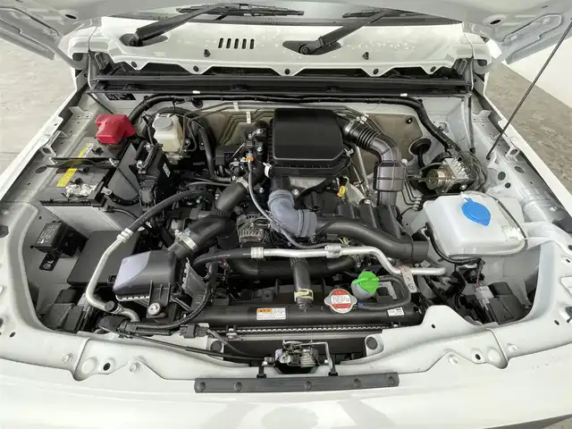 スズキ ジムニー XC 大分県 2024(令6)年 0.1千km ピュアホワイトP 登録済未使用車/社外７型ナビ　AVN-LBS01/デュアルブレーキセンサーサポート/誤発進抑制機能/車線逸脱警報/ふらつき警報/ハイビームアシスト/先行車発信お知らせ機能/標識認識機能/シートヒーター/スマートキー×２/ヘッドランプウォッシャー/電動格納ウィンカーミラー/フォグランプ/ステアリングリモコン