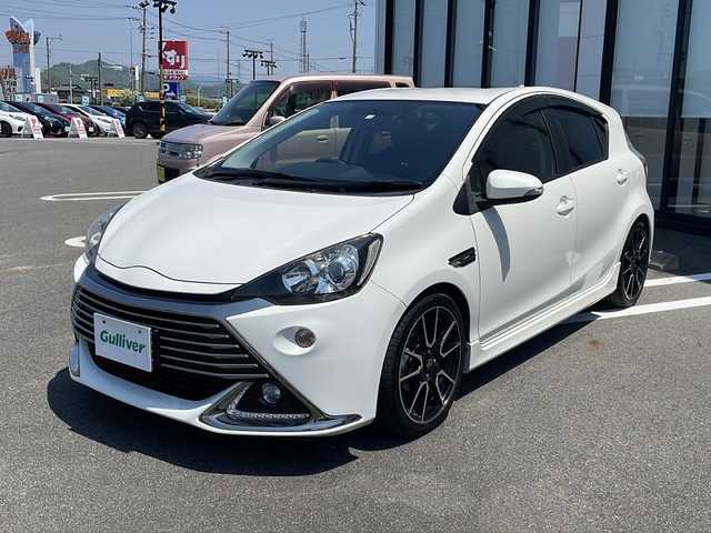 トヨタ アクア G G’s 岐阜県 2014(平26)年 11.3万km ライムホワイトパールクリスタルシャイン 社外ナビ　/バックカメラ　/ＥＴＣ　/オートライト　/ＡＢＳ　/ハーフレザーシート　/純正１７インチアルミホイール　/純正フロアマット　/プッシュスタート　/スマートキー　/フラットシート　/ステアリングスイッチ　/ドアバイザー