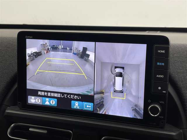 ホンダ フリード ハイブリット e:HEV AIR EX 滋賀県 2024(令6)年 1.3万km プラチナホワイトパール 純正9インチナビ/【Bluetooth/フルセグTV/Apple CarPlay/Android Auto】/両側パワースライドドア/全方位カメラ/ホンダセンシング/・衝突軽減ブレーキ（CMBS）/・先行車発進お知らせ機能/・歩行者事故低減ステアリング/・路外逸脱抑制機能/・標識認識機能/・渋滞追従機能付アダプティブクルーズコントロール/・車線維持支援システム/・トラフィックジャムアシスト/・ブラインドスポットインフォメーション/・誤発進抑制機能/・後方誤発進抑制機能/・近距離衝突軽減ブレーキ/・急アクセル抑制機能/・パーキングセンサーシステム/・後退出庫サポート/・オートハイビーム/・アダプティブドライビングビーム/ハーフレザーシート/D/Nシートヒーター/LEDヘッドライト/ビルトインETC/電動パーキングブレーキ/オートブレーキホールド/純正フロアマット/プッシュスタート/スマートキー/ステアリングリモコン/後席ロールサンシェード