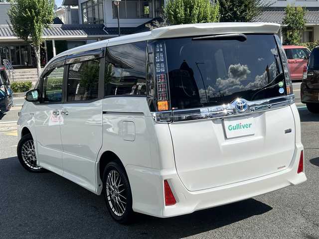 トヨタ ヴォクシー ハイブリッド ZS 煌Ⅱ 愛知県 2017(平29)年 5.3万km ホワイトパールクリスタルシャイン  ワンオーナー/ セーフティセンスC/ 両側パワースライドドア/ 純正9インチSDナビ　フルセグ/ BTオーディオ　CD DVD/ バックカメラ/ LEDヘッドライト/ フォグライト/ ドライブレコーダー/リヤクーラー/ スマートキー　スマートキースペアあり/ エンジンプッシュスタート/ BIN ETC 2.0/ 保証書　取説あり