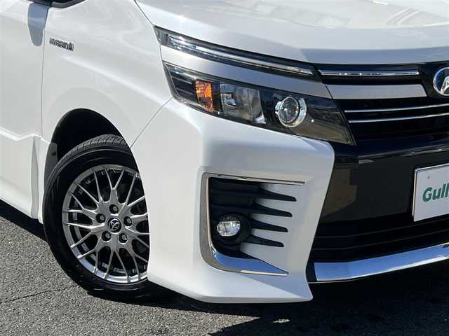 トヨタ ヴォクシー ハイブリッド ZS 煌Ⅱ 愛知県 2017(平29)年 5.3万km ホワイトパールクリスタルシャイン  ワンオーナー/ セーフティセンスC/ 両側パワースライドドア/ 純正9インチSDナビ　フルセグ/ BTオーディオ　CD DVD/ バックカメラ/ LEDヘッドライト/ フォグライト/ ドライブレコーダー/リヤクーラー/ スマートキー　スマートキースペアあり/ エンジンプッシュスタート/ BIN ETC 2.0/ 保証書　取説あり