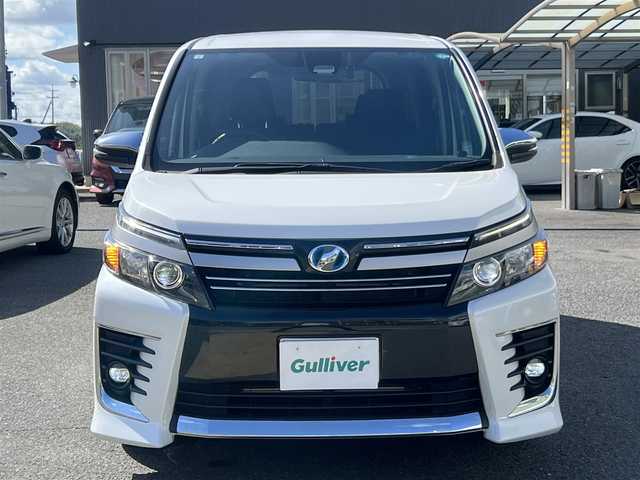 トヨタ ヴォクシー ハイブリッド ZS 煌Ⅱ 愛知県 2017(平29)年 5.3万km ホワイトパールクリスタルシャイン  ワンオーナー/ セーフティセンスC/ 両側パワースライドドア/ 純正9インチSDナビ　フルセグ/ BTオーディオ　CD DVD/ バックカメラ/ LEDヘッドライト/ フォグライト/ ドライブレコーダー/リヤクーラー/ スマートキー　スマートキースペアあり/ エンジンプッシュスタート/ BIN ETC 2.0/ 保証書　取説あり