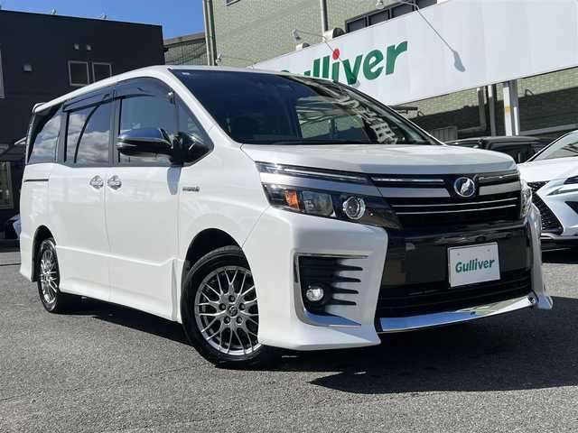 トヨタ ヴォクシー ハイブリッド ZS 煌Ⅱ 愛知県 2017(平29)年 5.3万km ホワイトパールクリスタルシャイン  ワンオーナー/ セーフティセンスC/ 両側パワースライドドア/ 純正9インチSDナビ　フルセグ/ BTオーディオ　CD DVD/ バックカメラ/ LEDヘッドライト/ フォグライト/ ドライブレコーダー/リヤクーラー/ スマートキー　スマートキースペアあり/ エンジンプッシュスタート/ BIN ETC 2.0/ 保証書　取説あり