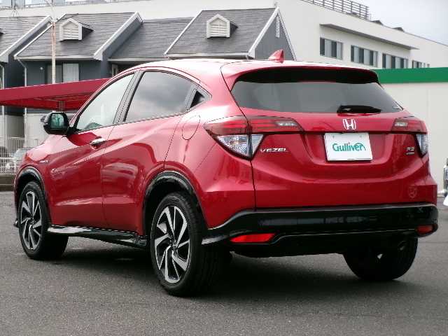 ホンダ ヴェゼル ハイブリッド RS ホンダセンシング 大分県 2017(平29)年 7万km プレミアムクリスタルレッドM 【 Honda SENSING 】/・衝突軽減ブレーキ 〈CMBS〉/・歩行者事故低減ステアリング/・ACC 〈アダプティブ・クルーズ・コントロール〉/・LKAS 〈車線維持支援システム〉/・路外逸脱抑制機能/・誤発進抑制機能/・先行車発進お知らせ機能/・標識認識機能/ワンオーナー/純正メモリーナビ/フルセグテレビ/バックカメラ/Bluetooth/DVD再生可能/ハーフレザーシート/社外ドライブレコーダー（フロント）/オートライト/ＬＥＤヘッドライト/ビルトインETC/スマートキー3個/純正フロアマット/純正18ＡＷ/D・N席シートヒーター
