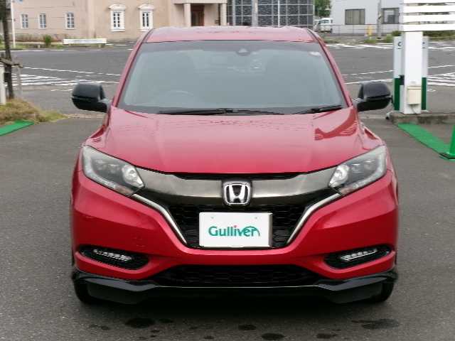 ホンダ ヴェゼル ハイブリッド RS ホンダセンシング 大分県 2017(平29)年 7万km プレミアムクリスタルレッドM 【 Honda SENSING 】/・衝突軽減ブレーキ 〈CMBS〉/・歩行者事故低減ステアリング/・ACC 〈アダプティブ・クルーズ・コントロール〉/・LKAS 〈車線維持支援システム〉/・路外逸脱抑制機能/・誤発進抑制機能/・先行車発進お知らせ機能/・標識認識機能/ワンオーナー/純正メモリーナビ/フルセグテレビ/バックカメラ/Bluetooth/DVD再生可能/ハーフレザーシート/社外ドライブレコーダー（フロント）/オートライト/ＬＥＤヘッドライト/ビルトインETC/スマートキー3個/純正フロアマット/純正18ＡＷ/D・N席シートヒーター