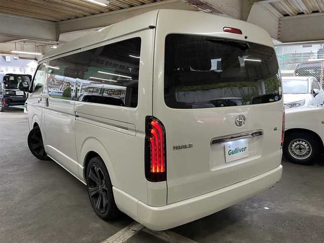 トヨタ ハイエース GL 熊本県 2017(平29)年 12.9万km ホワイトパールクリスタルシャイン ワンオーナー/ベッドキット/テーブル付き/社外SDナビ/　(AM/FM/CD/DVD/TV/SD/Bluetooth)/フルセグTV/バックカメラ/社外フリップダウンモニター/BARBEROアルミホイール18インチ/BARBEROアルミ付きスタッドレスタイヤ/LEDヘッドライト/オートライト/フォグランプ/ステアリングスイッチ/革巻きステアリング/ETC/スマートキー/プッシュスタート/レザー調シートカバー