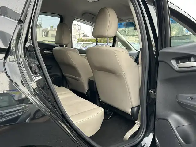 ホンダ シャトル ハイブリッド X 沖縄県 2016(平28)年 7.3万km クリスタルブラックパール (株)IDOMが運営する【じしゃロンコザ店】の自社ローン専用車両になりますこちらは現金またはオートローンご利用時の価格です。自社ローンご希望の方は別途その旨お申付け下さい/純正ナビ　/バックカメラ　/ＥＴＣ　/衝突軽減ブレーキ　/クルーズコントロール　/コーナーセンサー　/パドルシフト　/ハーフレザーシート　/純正アルミホイール　/プッシュスタート　/スマートキー　/オートライト