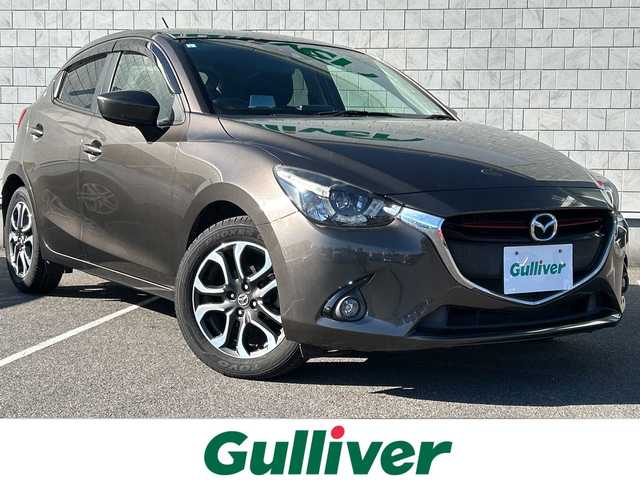 マツダ デミオ XD ツーリング 栃木県 2015(平27)年 11.1万km チタニウムフラッシュマイカ バックカメラ/フルセグＴＶ/Ｂｌｕｅｔｏｏｔｈ/ＥＴＣ/クルーズコントロール/パドルシフト/ＭＴ付ＡＴ/ヘッドアップディスプレイ/オートエアコン/オートライト/純正フロアマット/純正アルミホイール/ABS/横滑り防止機能/盗難防止装置/衝突被害軽減システム/スペアキー