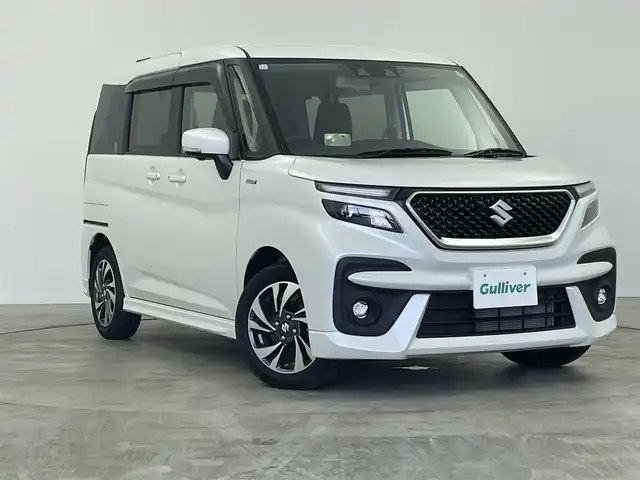 スズキ ソリオ バンディット HV MV 群馬県 2023(令5)年 0.6万km ピュアホワイトP 純正１０インチナビ/フルセグ（TV・BT・AM・FM・CD・DVD・USB）/全方周カメラ/ヘッドアップディスプレイ/ビルトインETC/前後ドアレコ/衝突軽減ブレーキ/両側パワースライド/ステアリングスイッチ/前席シートヒーター/スマートキー