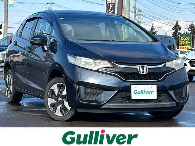ホンダ フィット ハイブリット Fパッケージ 道南・函館 2016(平28)年 7.8万km ミッドナイトブルービームM /社外ナビ//フルセグTV//寒冷地仕様//バックカメラ//ETC//プッシュスタート//スマートキー//純正フロアマット//横滑り防止装置//ドアバイザー//ウィンカーミラー//純正ホイールキャップ//アイドリングストップ