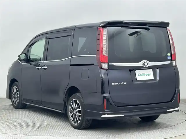 トヨタ エスクァイア Gi 道央・札幌 2015(平27)年 9.4万km スパークリングブラックパールクリスタルシャイン ・４WD/・寒冷地仕様/・車種専用BIG Xプレミアム10インチナビ/・CD/DVD/SD/BT/フルセグ/・バックカメラ/・ビルトインETC/・レーダー探知機/・クルーズコントロール/・オートマチックハイビーム/・LEDヘッドライト/・フォグランプ/・合皮シート/・両側パワースライドドア/・前席シートヒーター/・ステアリングスイッチ/・アイドリングストップ/・純正16インチAW/・社外15インチAW冬タイヤ積込/・純正エンジンスターター/・スペアキー/・純正フロアマット/・取扱説明書/・保証書