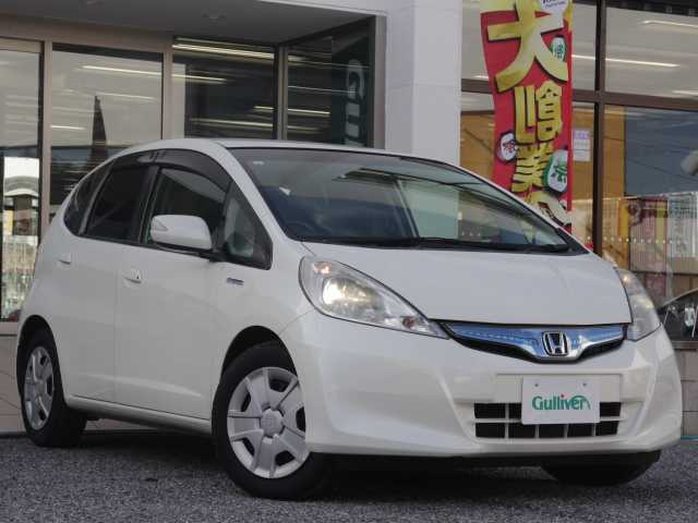ホンダ フィット ハイブリット スマート セレクション 千葉県 2013(平25)年 6.3万km プレミアムホワイトパール 純正9インチナビ(VXM-135VFNi)/バックカメラ /AM/FM/CD/DVD/フルセグTV/ビルトインETC/クルーズコントロール/ハーフレザー /シートヒーター /ドアバイザー/フロアマット/取扱説明書/保証書/スペアキー