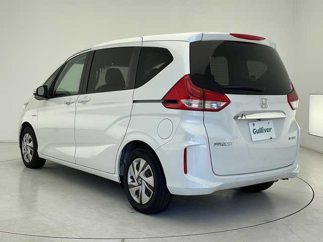 ホンダ フリード ハイブリット G ホンダセンシング 千葉県 2021(令3)年 3.5万km プラチナホワイトパール 社外SDナビ【MDV-D308BT】/　(ワンセグTV/Bluetooth/FM/AM/CD/DVD/USB)/ホンダセンシング/　衝突軽減ブレーキ/アダティブクルーズコントロール/　先行車発進お知らせ/路外逸脱抑制/　レーンキープアシスト/標識認識機能/ドライブレコーダー(前方のみ)【DC-XR1】/スペアキー(1本)/ETC/両側パワースライドドア/バックカメラ/ステアリングスイッチ/LEDヘッドライト/社外フロアマット/電動格納ウィンカーミラー/エアバッグ(W)/オートライト/プッシュスタート