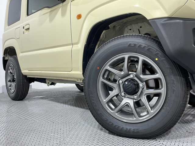 スズキ ジムニー XC 広島県 2023(令5)年 0.9万km シフォンアイボリーM シートヒーター/デュアルセンサーブレーキサポート/車線逸脱警報/ハイビームアシスト/クルーズコントロール/誤発進抑制機能/トランスファーレバー/ダウンヒルアシストコントロール/LEDヘッドランプ/純正15インチAW