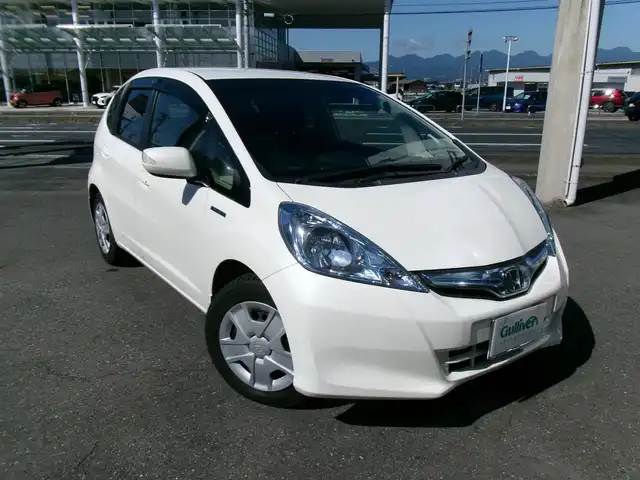 ホンダ フィット ハイブリット スマート セレクション 群馬県 2013(平25)年 6.9万km プレミアムホワイトパール メモリナビ/ワンセグテレビ/バックカメラ/クルーズコントロール/ETC/HID