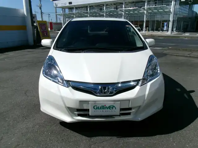 ホンダ フィット ハイブリット スマート セレクション 群馬県 2013(平25)年 6.9万km プレミアムホワイトパール メモリナビ/ワンセグテレビ/バックカメラ/クルーズコントロール/ETC/HID