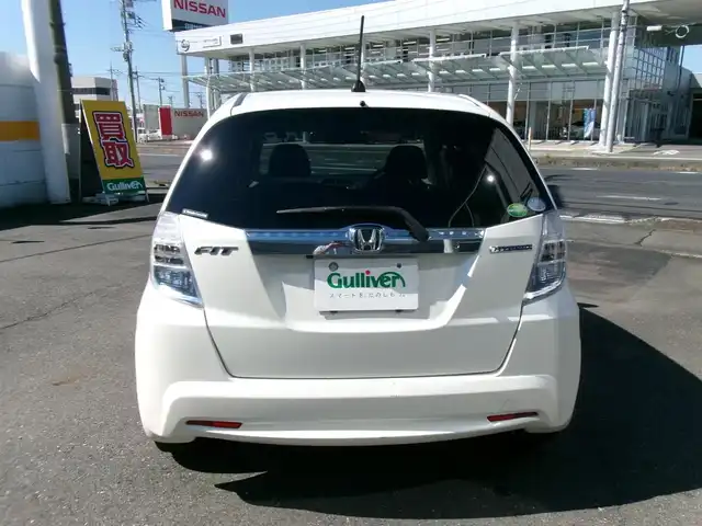 ホンダ フィット ハイブリット スマート セレクション 群馬県 2013(平25)年 6.9万km プレミアムホワイトパール メモリナビ/ワンセグテレビ/バックカメラ/クルーズコントロール/ETC/HID