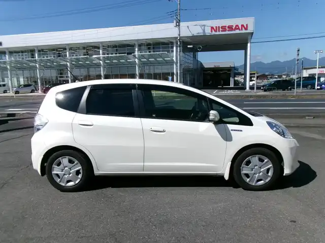 ホンダ フィット ハイブリット スマート セレクション 群馬県 2013(平25)年 6.9万km プレミアムホワイトパール メモリナビ/ワンセグテレビ/バックカメラ/クルーズコントロール/ETC/HID