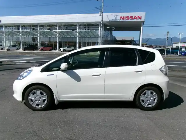 ホンダ フィット ハイブリット スマート セレクション 群馬県 2013(平25)年 6.9万km プレミアムホワイトパール メモリナビ/ワンセグテレビ/バックカメラ/クルーズコントロール/ETC/HID