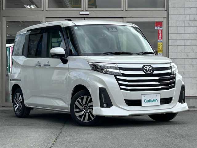 トヨタ ルーミー カスタムG 岩手県 2024(令6)年 0.1万km パールホワイトⅢ ・ワンオーナー/・両側パワースライドドア/・ACC（アクティブクルーズコントロール）/・純正ディスプレイオーディオ（Ａｐｐｌｅ　ＣａｒＰｌａｙ/フルセグTV/BT/USB/ipod/ラジオ）/・全周囲カメラ/・Ｄ席＋Ｎ席シートヒーター/・電子パーキング/・ブレーキホールド/・横滑り防止/・アイドリングストップ/・純正フロアマット/・ドアバイザー/・サンシェード/・オートライト/・nanoe エアコン