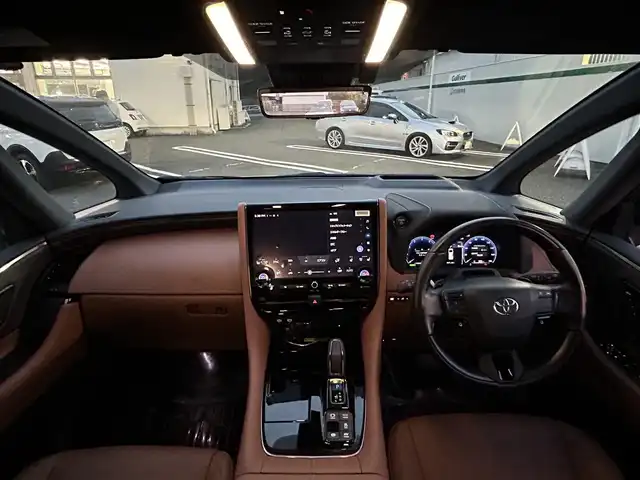 トヨタ ヴェルファイア ハイブリット Z プレミア 東京都 2024(令6)年 1.1万km プラチナホワイトパールマイカ ワンオーナー/４WD/純正ナビ/・Bluetooth/TV/USB/Toyota　Safety　Sense/・プリクラッシュセーフティー/・レーントレーシングアシスト＋レーンディパーチャーアラート/・レーダークルーズコントロール/・アダクティブハイビームシステム/・ロードサインアシスト/・ドライバー異常時対応システム/・プロアクティブドライビングアシスト/・発信遅れ告知機能/ブラインドスポットモニター＋安心降車アシスト＋後方車両接近告知＋周辺車両接近時サポート/パノラミックビューモニター/バックカメラ/おくだけ充電/ガラスルーフ/サンシェード/室内カーテン/フリップダウンモニター/ユニバーサルステップ/オートライト/両側パワースライドドア/コーナーセンサー/スペアキー1本
