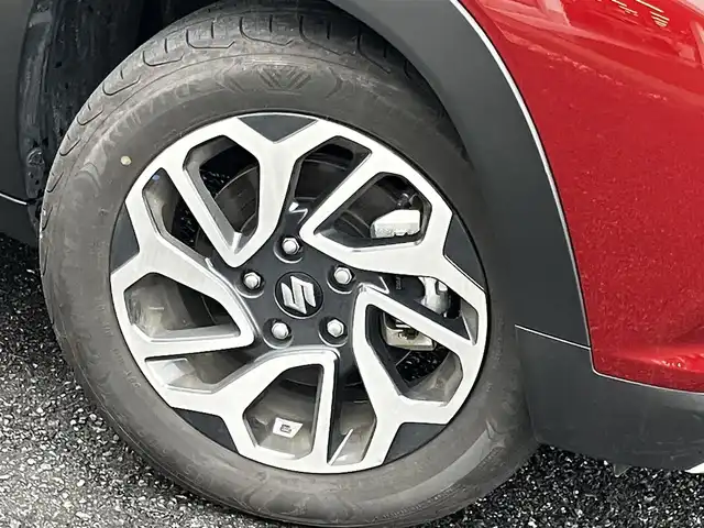 スズキ フロンクス 山口県 2024(令6)年 0.8万km 赤Ⅱ 4WD/デュアルセンサー/　ブレーキサポートII/純正ナビ＆フルセグTV/　＆全方位モニター/純正LEDヘッドライト/純正16インチアルミ/フロントシートヒーター/ヘッドアップディスプレイ/おくだけ充電/レーンキープアシスト/衝突被害軽減ブレーキ/アダプティブ/　クルーズコントロール/パドルシフト/オートハイビーム