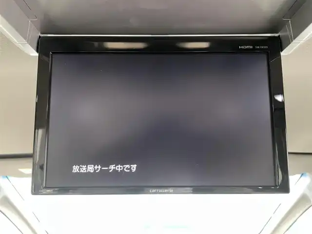 ホンダ ステップワゴン スパーダ クルスピセンシング 鹿児島県 2016(平28)年 6.4万km プレミアムスパークルブラックパール フリップダウンモニター/純正9インチナビ/　●Bluetooth接続/　●AppleCarPlay/　●フルセグTV/　●DVD再生/バックカメラ/わくわくゲート/運転席＆助手席シートヒーター/両側パワースライドドア/純正ドアバイザー/純正フロアマット/パドルシフト/Honda SENSING/　●衝突軽減ブレーキ/　●アダプティブ・クルーズ・コントロール/　●車線維持支援システム/　●路外逸脱抑制機能/　●誤発進抑制機能/　●先行車発進お知らせ機能/　●標識認識機能/本革巻きステアリング/LEDヘッドライト/オートライト/フォグランプ/ETC/純正アルミホイール