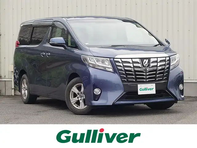 トヨタ アルファード X 山形県 2015(平27)年 8.7万km グレイッシュブルーマイカメタリック 純正フリップダウンモニター/純正SDナビ/　　【CD DVD BT フルセグ MSV】/バックカメラ/両側パワースライドドア/LEDオートヘッドライト/純正16インチアルミホイール/コーナーセンサー/ステアリングスイッチ/MTモード付AT/電動格納ウィンカーミラー/フォグランプ/純正フロアマット/ドアバイザ―/スマートキー×2/ETC
