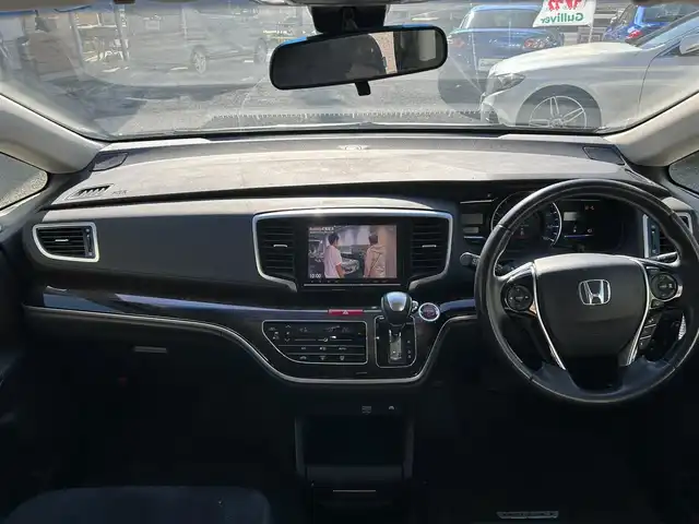 ホンダ オデッセイ ハイブリッド 東京都 2016(平28)年 7万km クリスタルブラックパール ワンオーナー/純正SDナビ/　フルセグTV/SD/CD・DVD/Bluetooth/AM・FM/バックカメラ/アダプティブクルーズコントロール/アイドリングストップ/衝突被害軽減ブレーキ/レーンキープアシスト/横滑り防止装置/純正ビルトインＥＴＣ/純正18インチアルミホイール/純正フロアマット/片側パワースライドドア/ステアリングスイッチ/プッシュスタート/カーテンエアバック/LEDヘッドライト/オートライト/パワーステアリング/パワーウィンドウ/スマートキー/ドアバイザー/保証書/取扱説明書/スペアキー