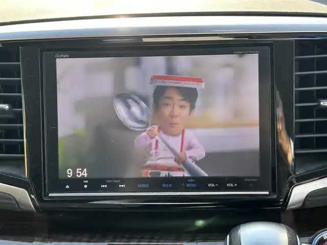 ホンダ オデッセイ ハイブリッド 東京都 2016(平28)年 7万km クリスタルブラックパール ワンオーナー/純正SDナビ/　フルセグTV/SD/CD・DVD/Bluetooth/AM・FM/バックカメラ/アダプティブクルーズコントロール/アイドリングストップ/衝突被害軽減ブレーキ/レーンキープアシスト/横滑り防止装置/純正ビルトインＥＴＣ/純正18インチアルミホイール/純正フロアマット/片側パワースライドドア/ステアリングスイッチ/プッシュスタート/カーテンエアバック/LEDヘッドライト/オートライト/パワーステアリング/パワーウィンドウ/スマートキー/ドアバイザー/保証書/取扱説明書/スペアキー