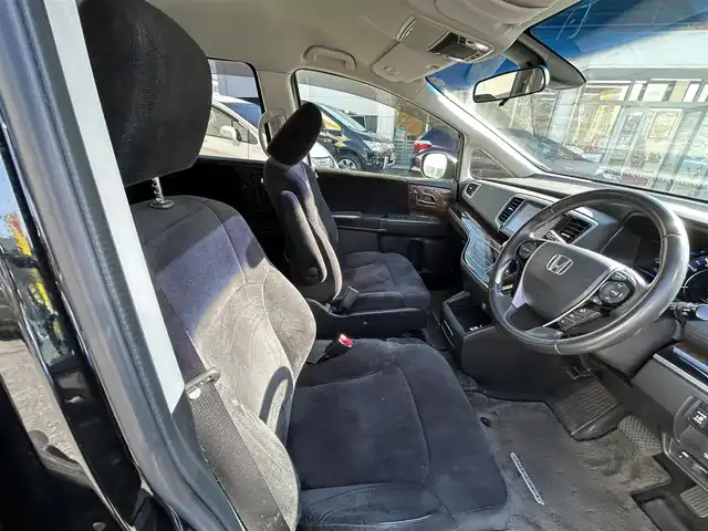 ホンダ オデッセイ ハイブリッド 東京都 2016(平28)年 7万km クリスタルブラックパール ワンオーナー/純正SDナビ/　フルセグTV/SD/CD・DVD/Bluetooth/AM・FM/バックカメラ/アダプティブクルーズコントロール/アイドリングストップ/衝突被害軽減ブレーキ/レーンキープアシスト/横滑り防止装置/純正ビルトインＥＴＣ/純正18インチアルミホイール/純正フロアマット/片側パワースライドドア/ステアリングスイッチ/プッシュスタート/カーテンエアバック/LEDヘッドライト/オートライト/パワーステアリング/パワーウィンドウ/スマートキー/ドアバイザー/保証書/取扱説明書/スペアキー