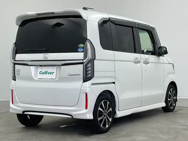 ホンダ Ｎ ＢＯＸ カスタム G L ホンダセンシング 新潟県 2019(令1)年 6.5万km プラチナホワイトパール ストラーダメモリナビ【CN-RE06D】/　TV/Bluetooth/CD/DVD/衝突被害軽減ブレーキ/レーンキープアシスト/後方コーナーセンサー/前席シートヒーター/片側パワースライドドア/ドライブレコーダー/ビルトインETC/バックモニター/アイドリングストップ/横滑り防止装置/LEDヘッドライト/オートマチックハイビーム/オートライト/禁煙車